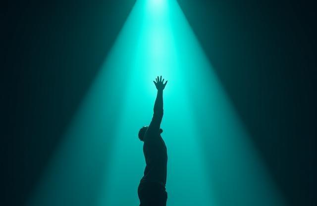 Person reaching for a spotlight or media symbol, representing achieving media presence